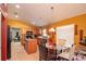 View of the kitchen and dining area, highlighting the open layout and natural light at 4067 Sw 46Th Ter, Ocala, FL 34474