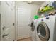 Clean laundry room with white washer and dryer units at 4067 Sw 46Th Ter, Ocala, FL 34474