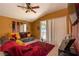 Gathering room with a plush sofa, sliding glass doors, and warm natural light at 4067 Sw 46Th Ter, Ocala, FL 34474