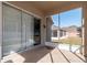 Exterior view of the screened patio with sliding glass doors to the yard at 4067 Sw 46Th Ter, Ocala, FL 34474