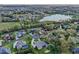 An aerial view of a neighborhood by a lake at 6327 Ashley Dr, Lakeland, FL 33813