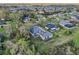 Expansive aerial view of a neighborhood with well-maintained lawns and mature trees at 6327 Ashley Dr, Lakeland, FL 33813