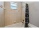 Clean bathroom with a tub and shower combination featuring a patterned shower curtain at 6327 Ashley Dr, Lakeland, FL 33813