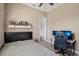 Bedroom featuring a ceiling fan, gaming setup and natural light from the window at 6327 Ashley Dr, Lakeland, FL 33813