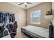 Bedroom featuring a ceiling fan and natural light from the window at 6327 Ashley Dr, Lakeland, FL 33813