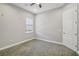 Cozy bedroom with a ceiling fan and window at 6327 Ashley Dr, Lakeland, FL 33813