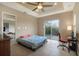 Bedroom with sliding glass doors to patio with access to outdoors and an attached workspace at 6327 Ashley Dr, Lakeland, FL 33813