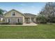 Charming home featuring an inviting entrance, stone accents, and manicured landscaping at 6327 Ashley Dr, Lakeland, FL 33813