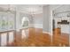Bright room featuring hardwood floors, elegant lighting, and decorative trim at 6327 Ashley Dr, Lakeland, FL 33813
