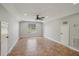 Spacious living room with tile flooring, ceiling fan, and ample natural light at 6327 Ashley Dr, Lakeland, FL 33813