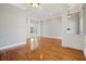 Spacious living room featuring hardwood floors, elegant lighting, and decorative trim at 6327 Ashley Dr, Lakeland, FL 33813