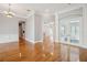Living room showing hardwood floors with open doorways at 6327 Ashley Dr, Lakeland, FL 33813
