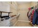 Spacious walk-in closet offering ample storage space with metal shelving at 6327 Ashley Dr, Lakeland, FL 33813