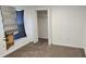 Simple carpeted bedroom with closet, offering a basic and functional living space at 1404 Country Chase Dr, Lakeland, FL 33810