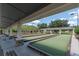 Well-maintained bocce ball courts with shaded seating areas, ideal for social gatherings and outdoor fun at 9761 Sw 74Th Pl, Ocala, FL 34481