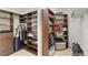 Spacious walk-in closet with custom shelving and ample space for storage at 9761 Sw 74Th Pl, Ocala, FL 34481