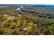Expansive property features wooded areas, meandering rivers, and several buildings at 4942 Cr 300, Lake Panasoffkee, FL 33538