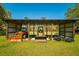 Covered tractor and equipment storage for easy access and protection from the elements at 4942 Cr 300, Lake Panasoffkee, FL 33538