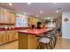 Open kitchen design featuring an eat-in island, stainless appliances, and abundant cabinet space at 4942 Cr 300, Lake Panasoffkee, FL 33538