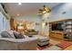 Open-concept living area with a view into the kitchen and comfortable seating at 4942 Cr 300, Lake Panasoffkee, FL 33538