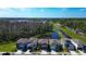 New homes near a pond and conservation area showcase the community's natural beauty at 2244 Teneroc Trl, Lakeland, FL 33805