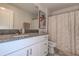 Bathroom featuring a granite countertop vanity, white cabinets, a toilet, and a shower with a patterned curtain at 2244 Teneroc Trl, Lakeland, FL 33805