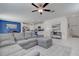 Modern living room flows into an open kitchen and dining area at 2244 Teneroc Trl, Lakeland, FL 33805