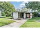 Charming single-story home featuring modern design and appealing curb appeal at 407 W Oak Dr, Lakeland, FL 33803