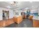 Well-designed kitchen with stainless steel appliances and central island for meal prep at 407 W Oak Dr, Lakeland, FL 33803