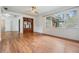 Open living area featuring hardwood floors, neutral tones and natural light at 407 W Oak Dr, Lakeland, FL 33803