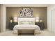 Calm main bedroom with decorative wall art, bench and nightstands with lamps at 950 Hour Glass Rd, Lakeland, FL 33801