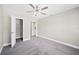 Spacious bedroom featuring plush carpeting and a ceiling fan at 1126 Waterview E Blvd, Lakeland, FL 33801