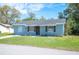 Quaint one story house with front yard at 1126 Waterview E Blvd, Lakeland, FL 33801