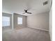 Spacious bedroom with natural light and a ceiling fan at 5335 River Rock Rd, Lakeland, FL 33809