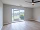 Empty bedroom with access to the porch at 5335 River Rock Rd, Lakeland, FL 33809