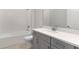 Bathroom with tub, shower, and vanity with white countertop at 5646 Nevis Ter, Kissimmee, FL 34758