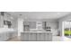 Modern kitchen with quartz countertops, stainless steel appliances, and abundant cabinet storage at 5646 Nevis Ter, Kissimmee, FL 34758