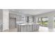 Well-designed kitchen featuring a central island, modern appliances, and convenient access to the outdoors at 5646 Nevis Ter, Kissimmee, FL 34758
