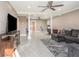 Spacious living room featuring elegant columns, neutral tones, and tile flooring at 915 E Lake Parker Dr, Lakeland, FL 33801