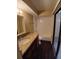 Bathroom with granite countertop, wood cabinets, and shower/tub combination at 1135 Linkside Ct, Apopka, FL 32712