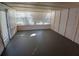 Sunroom with large windows offering natural light and neutral walls at 1135 Linkside Ct, Apopka, FL 32712