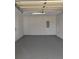 Garage with painted floor and storage at 1135 Linkside Ct, Apopka, FL 32712