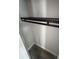 Small closet featuring modern flooring, updated shelf, and fresh paint at 1460 Marvin C Zanders Ave, Apopka, FL 32703