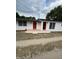 Charming single-story home featuring a fresh exterior paint, red door, and well-maintained front yard at 1460 Marvin C Zanders Ave, Apopka, FL 32703
