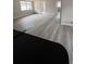 Spacious living room featuring new flooring, light-colored walls, and natural light at 1460 Marvin C Zanders Ave, Apopka, FL 32703