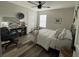 Cozy bedroom with neutral colors, ceiling fan, and modern décor at 4513 Yorkshire Ln, Kissimmee, FL 34758