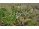 Aerial view of a single Gathering home nestled amongst mature landscaping at 2920 Ewell Rd, Lakeland, FL 33811