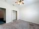 Bedroom features closet and door opening to another room at 2920 Ewell Rd, Lakeland, FL 33811