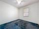 Empty bedroom features window for natural light and ceiling fan at 2920 Ewell Rd, Lakeland, FL 33811