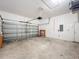 Spacious two car garage with ample storage and automatic door at 2920 Ewell Rd, Lakeland, FL 33811